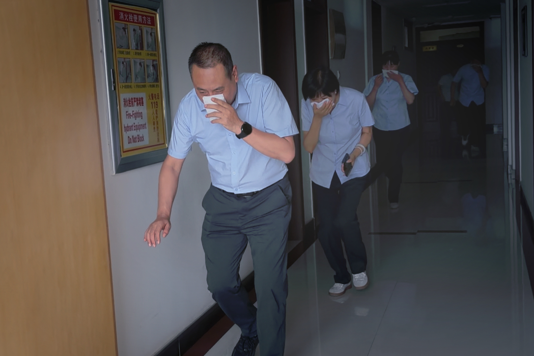 抓实消防应急演练  织密公司安全屏障—— 敦煌种业总部机关开展消防应急演练